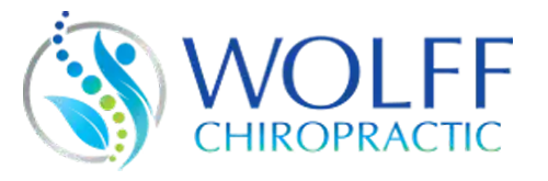 A modern chiropractic logo with curved blue and green shapes